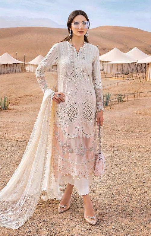 Soft ivory tones, intricate lace, and an effortless silhouette — made to mesmerize.