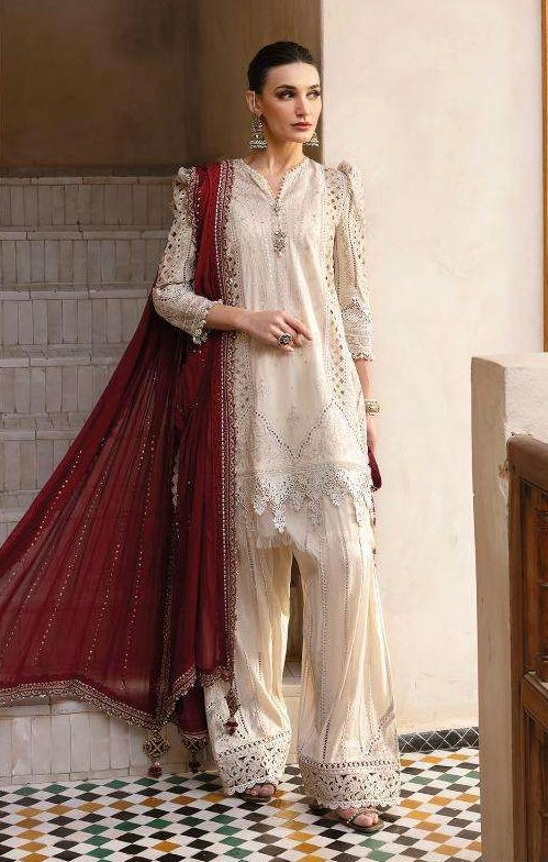 Classic ivory embroidered shirt paired beautifully with a deep maroon dupatta for an effortlessly royal look.